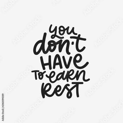 You don't have to earn rest inspirational hand lettered quote. Modern black and white typography design promoting self care, mental wellness, balance and positive mindset.
