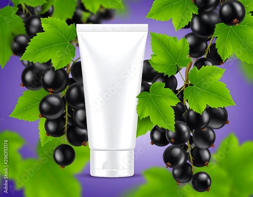 A white cosmetic tube surrounded by blackcurrants and green leaves on purple background