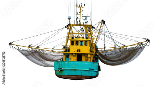Foto Yellow and turquoise fishing trawler with nets deployed