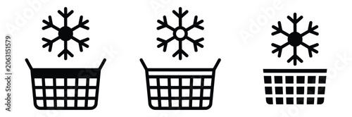 Black icons of shopping carts with snowflakes on top for winter sales and discounts concept
