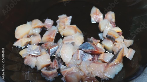 Freshly caught fish diced and served in a black ceramic bowl, great for seafood platters or appetizers