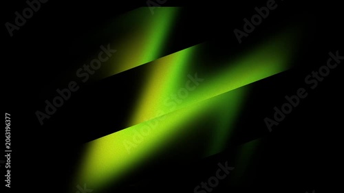 4k video captures the vibrancy of the yellow and green striped abstract background.