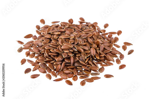 Fotografie Pile of brown flax seeds linseed heap isolated on white background food photogra