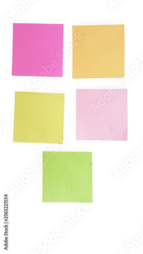 Four colorful sticky notes arranged on a flat surface