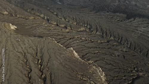 Aerial Over Eroded Volcanic Ash Field Revealing Krakatau Cone