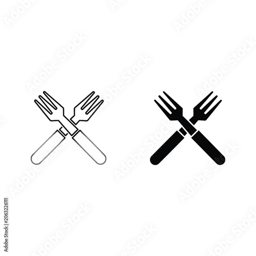 Фотография Crossed fork and knife icon set in black and white with utensils tableware flatw