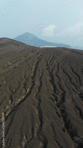 Aerial Of Tourists Hiking Up Anak Krakatau Volcano Ash Slope