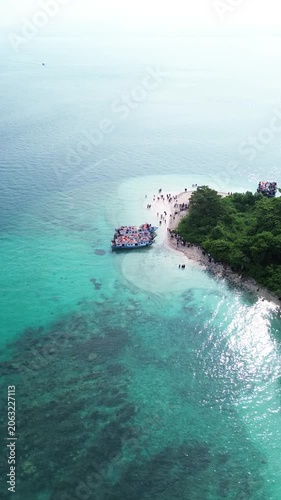 Aerial Of Island Point With Tour Boat And Snorkelers On Reef