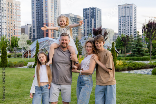 happy large family in the city in summer