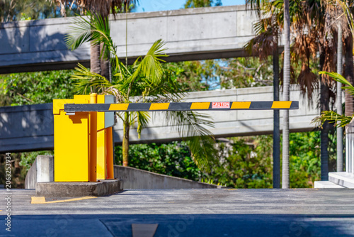 Photograph of a boom gate at the entry and exit point to a public carpark in a Western Sydney suburb in New South Wales, Australia