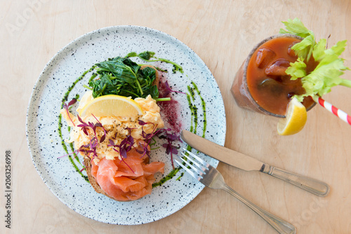 фотографія Delightful Brunch With Scrambled Eggs, Smoked Salmon, and a Refreshing Drink