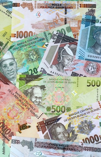 Fotografía Guinean franc money banknotes bunch on table