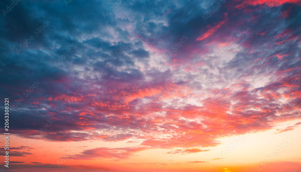 Fototapeta premium Fantastic sunset and soft pink clouds of pastel tones. Image template of textured sky.