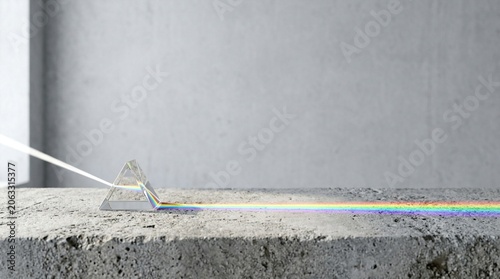 Light spectrum refraction through glass prism on rough concrete surface, science experiment demonstration