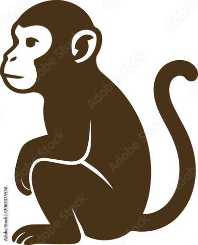 Photography A seated monkey in clean side profile with a rich brown body and white face detail