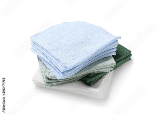 Stack of folded blue, green...