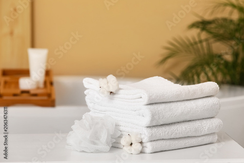 Stacked white cotton towels...