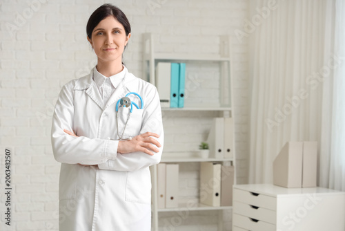Confident female doctor in ...