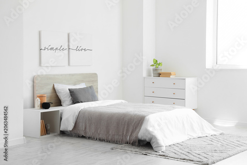 Interior of light bedroom w...