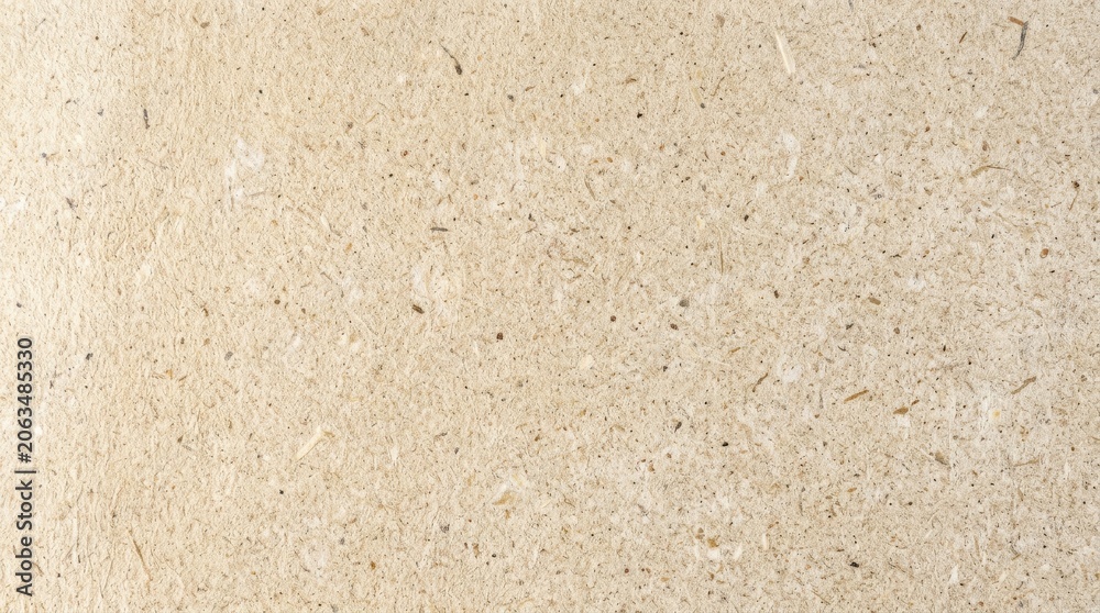 Fototapeta premium Speckled recycled paper texture background with light beige granular surface backdrop background