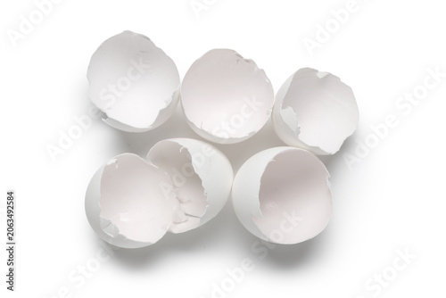 Broken egg shells on white ...