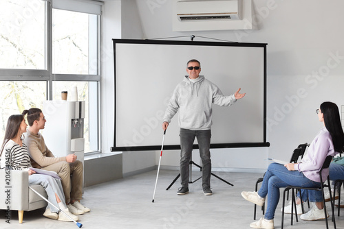 Blind male business speaker...