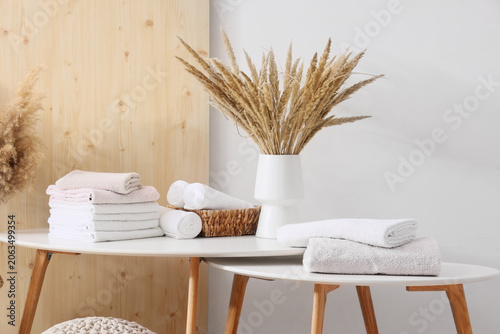 Clean soft towels and vase ...