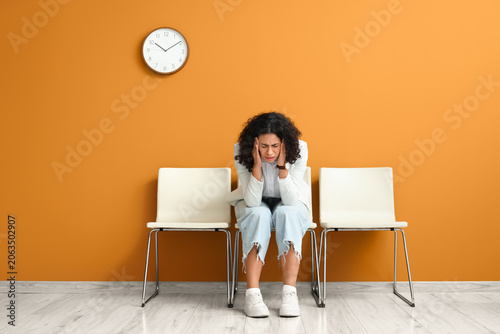 Stressed female African-Ame...