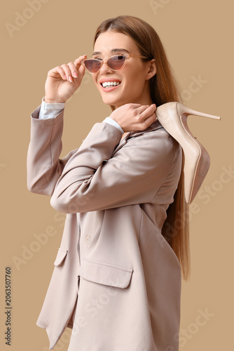 Stylish young woman with hi...