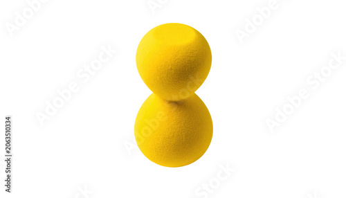 Two yellow spheres rest atop each other creating the illusion of an hourglass shape, isolated on a stark black background