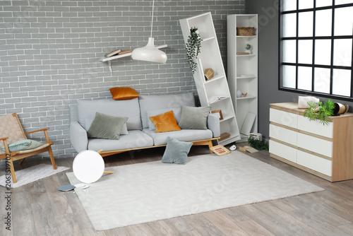 Interior of messy living ro...