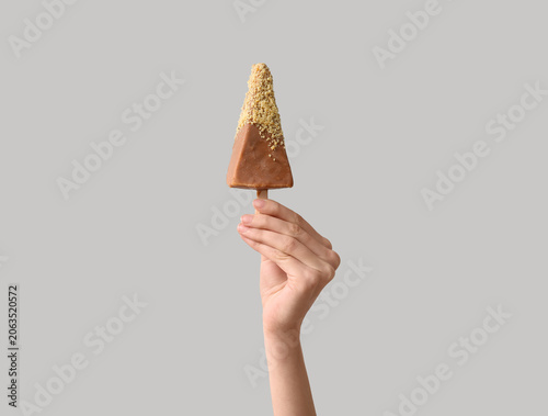Female hand with tasty chee...