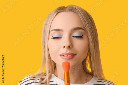 Beautiful young woman with ...