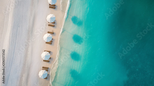 Aerial Tropical Beach with White Umbrellas and Turquoise Sea