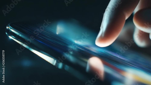 Finger interacting with a modern digital touchscreen