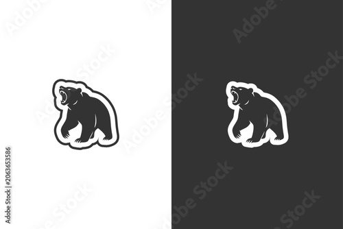 Obraz na płótnie A graphic silhouette of a bear with its mouth open, presented in a stylized, bol