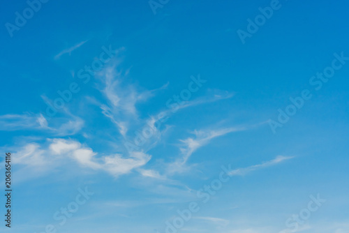 Bright Blue Sky and White Clouds Background.