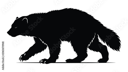 Schilderij op canvas Wolverine silhouette prowls across a flat surface with sharp claws visible