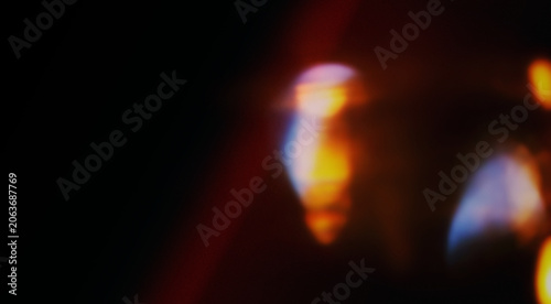 Colorful Prism Light Leak Effect on Dark Background, Abstract Cinematic Glow Texture Design