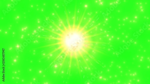 Glowing yellow starburst effects on green background