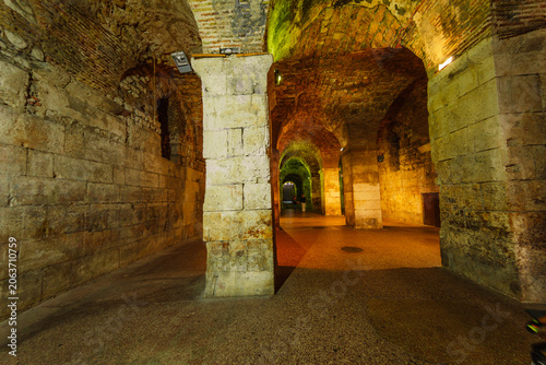 Fényképezés Ancient narrow passages underground and stone alleys within the walls of Diocletian's Palace, a UNESCO World Heritage site in Split, Croatia