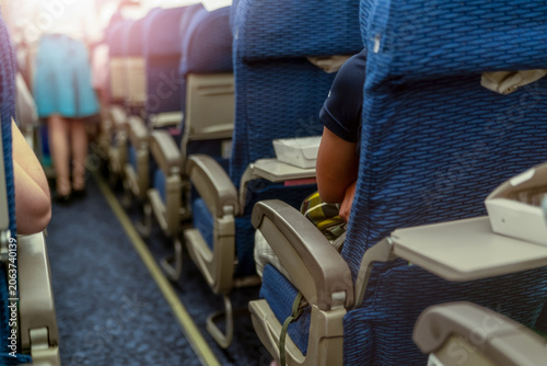 Cuadro en lienzo Passenger inside economy seat of commercial airplane