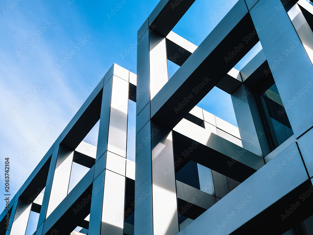 Naklejka premium Architecture details Building structure Metal columns Low angle view Blue sky background
