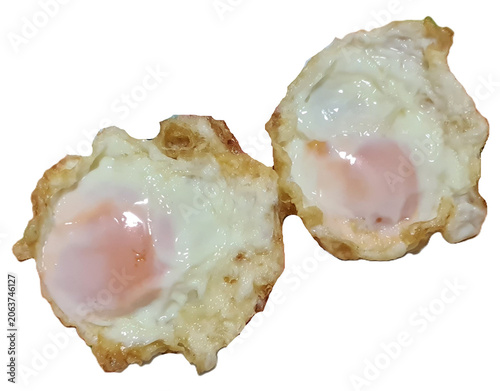 two Thai deep fried eggs isolated on white background