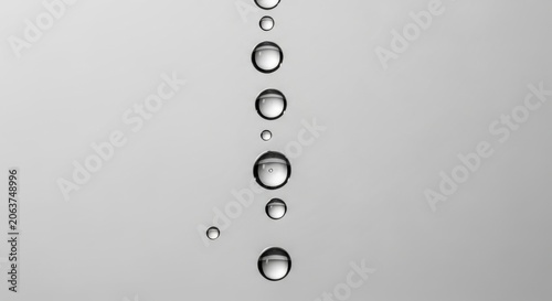 Perfect Spheres of Water Droplets Falling