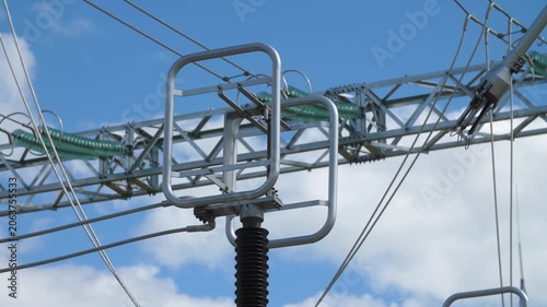 High voltage electric tower connecting to grid power industry line.