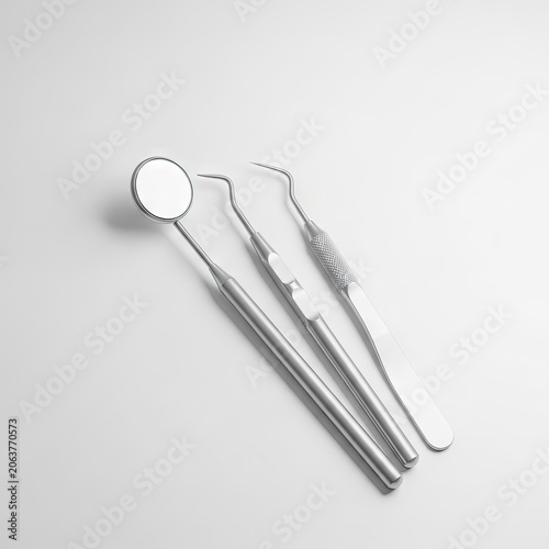 Dental Tools Set on White Background for Oral Health and Hygiene.