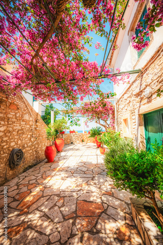 Holy Monastery of the Virgin Mary at Paleokastritsa in Corfu. Palaiokastritsa bay on the Greek island of Corfu