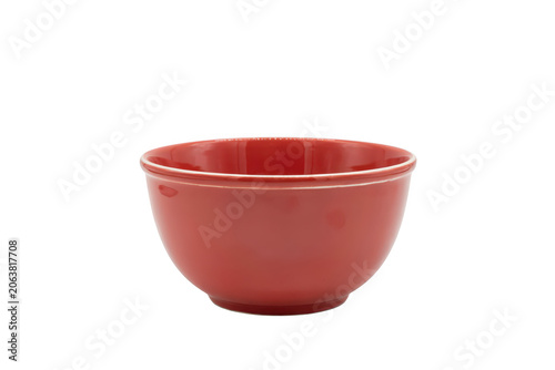 A single empty red ceramic bowl with a smooth glossy finish and a simple rounded shape, isolated on a white background, for food
