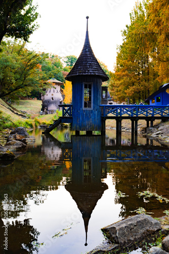 Blue Waterside Tower Reflected in a Pond at Moomin Valley Park, Japan